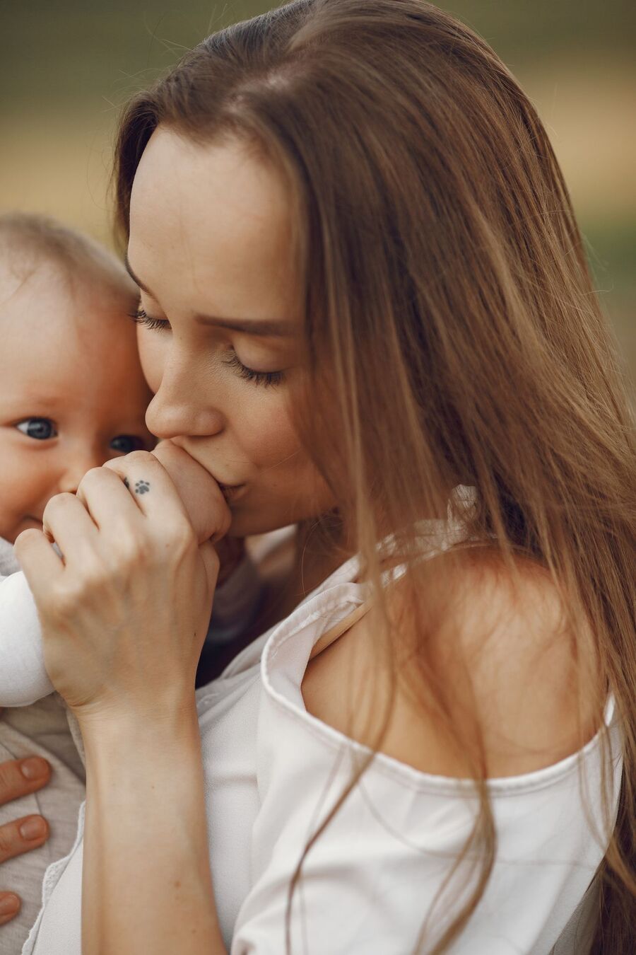 Mãe segurando seu bebê